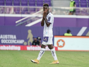 Gloire Amanda of Austria Klagenfurt is downed after a red card during the Admiral Bundesliga match between Austria Wien and SK Austria Klagenfurt at Generali-Arena on August 15, 2021, in Vienna, Austria.  But his experience as a professional in Europe has been primarily a dream.