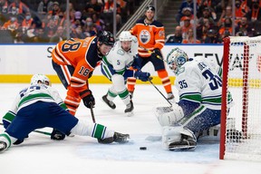 Zach Hyman of the Edmonton Oilers shoots at Vancouver Canucks goalie Thatcher Demko during the second period at Rogers Place on Wednesday.