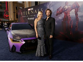 Malin Akerman and Jack Donnelly arrive for the world premiere of Marvel Studios' Eternals at the El Capitan Theater in Hollywood on October 18, 2021.