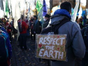 GLASGOW, SCOTLAND - Pilgrimage groups who have walked to Glasgow join members of the Extinction Rebellion group as they walk to raise awareness of the climate crisis on October 30, 2021 in Glasgow, Scotland.