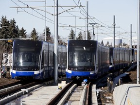 LRT trains are parked on the Valley LRT line under construction near 66 Street and 36A Avenue in Edmonton on March 15, 2021.