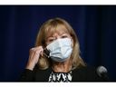 Ontario Health Minister Christine Elliott removes her mask to speak at a press conference at Queen's Park in Toronto, Wednesday, Sept. 22, 2021.