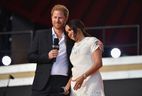 Britain's Prince Harry and Meghan Markle speak during the 2021 Global Citizen Live festival at Great Lawn, Central Park on September 25, 2021 in New York City.