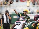 Edmonton Elks quarterback Trevor Harris pitches against the Montreal Alouettes during the first half in Edmonton on August 14, 2021.