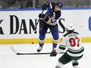 Blues' Mike Hoffman flips the record past Wild's Kirill Kaprizov last season.  Hoffman signed a three-year, $ 13.5 million deal with the Canadiens this offseason.