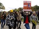 Montreal residents participate in a dance party to urge Quebec to open dance floors during a protest on Saturday, October 23, 2021, at Mount Royal. 