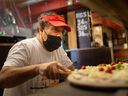 Bob Abumeeiz of Windsor's Arcata Pizzeria prepares a cake on August 12, 2021. Arcata is one of the pizzerias featured in a new Windsor pizza documentary, The City of Pizza You've Never Heard of.