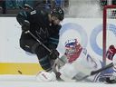 Canadiens goalkeeper Jake Allen hinders Sharks center Andrew Cogliano during the second period Thursday night in San Jose.