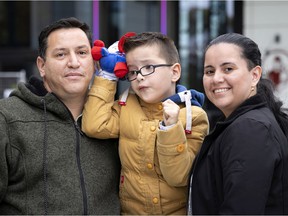 Yonny Peña, Santiago and Yarledy Peña, in front of the Montreal Children's Hospital.