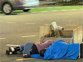 Several climate protesters were arrested Friday night after chaining themselves to a concrete block at the intersection of Burrard and Pacific streets in Vancouver.