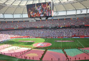 Fans from the USA cheer for their team ahead of the 2015 FIFA Women's World Cup final between the USA and Japan at BC Place Stadium on July 5, 2015.