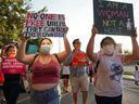 Supporters of reproductive choice participate in the National Women's March, which took place after Texas implemented a near-total ban on abortion procedures and access to abortion-inducing medications, in Brownsville, Texas. , on October 2, 2021.