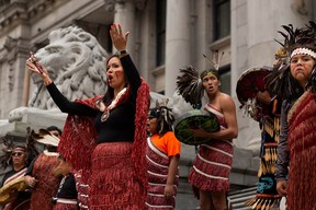 Dancers from the Coastal Wolf Pack perform for the crowd on Canada's first National Truth and Reconciliation Day in the North Plaza of the Vancouver Art Gallery on Thursday, Sept. 30, 2021.