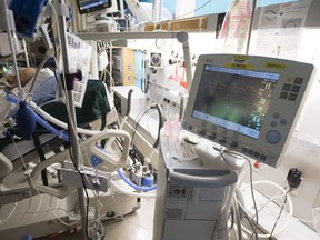 A patient is hooked up to a ventilator in the COVID-19 intensive care unit at St. Paul's Hospital in downtown Vancouver on April 21, 2020.