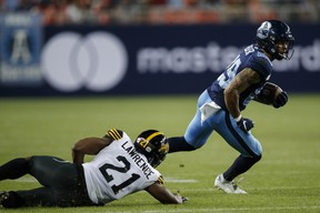 Toronto Argonauts running back DJ Foster, avoiding an inning from Tiger-Cats linebacker Simoni Lawrence on Friday, Sept. 10, 2021, will have some help in the running back department for Monday's rematch at Hamilton with AJ Ouelette returning to duty. active.  .