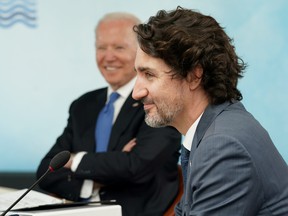 US President Joe Biden and Canadian Prime Minister Justin Trudeau attend a session during the G7 summit in Carbis Bay, Cornwall, Britain, on June 11, 2021.