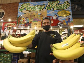 Mario Aricci of Ponesse Foods in St. Lawrence Market said that prices for his fruits and vegetables have recently skyrocketed and he has noticed a decline in clientele in the overall market.  Jack Boland / Toronto Sun