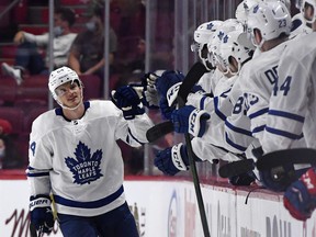 Toronto Maple Leafs forward David Kampf reacts with his teammates after scoring a goal against the Montreal Canadiens during the second period at Montreal's Bell Center on September 27, 2021.