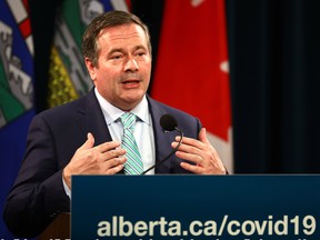 Prime Minister Jason Kenney, along with Health Minister Jason Copping, provide an update on COVID-19 and ongoing work to protect public health at the McDougall Center in Calgary on October 5, 2021.