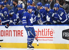 Toronto Maple Leafs defender Morgan Rielly (44) celebrates with teammates after scoring against the Ottawa Senators in the first period at Scotiabank Arena.
