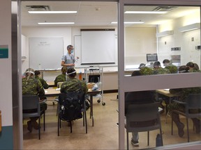 Canadian Armed Forces intensive care nurses and a senior nursing officer arrive at the Royal Alexandra Hospital for counseling on Wednesday, October 6, 2021, before starting work to help relieve tension in Edmonton's ICUs.