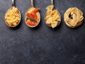 Various pasta in spoons