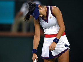Emma Raducanu reacts after losing a point to Aliaksandra Sasnovich at Indian Wells Tennis Garden in California on October 8, 2021.