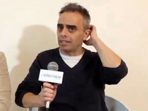 Film director Joel Souza speaks during an interview in 2019 in this still image obtained from a social media video.