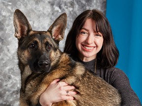 Edmonton writer Shelby Carleton and the dog Commander, named for a video game hero.  Carleton began working for Sledgehammer Games in March to help write the latest Call of Duty game, Call of Duty: Vanguard, which is scheduled to release on November 5.  Commander will be moving to California with Carleton next year.