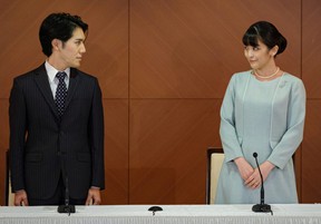 Princess Mako of Japan and her husband Kei Komuro attend a press conference to announce their wedding at the Grand Arc Hotel in Tokyo, Japan on October 26, 2021.