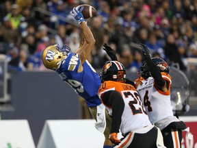 Winnipeg Blue Bombers WR Kenny Lawler goes up for a touchdown reception against the BC Lions at IG Field in Winnipeg on Saturday, Oct. 23, 2021.
