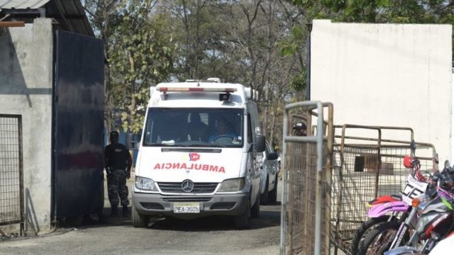 An ambulance leaving the prison