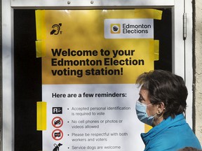 Edmontons are waiting for the early voting station at the Hazeldean Community League, 9630 66 Avenue, to open in Edmonton on Monday, October 4, 2021. In addition to the municipal elections, Albertans will also vote on two questions from referendum regarding equalization.  and daylight saving time throughout the year, and a Senate election.