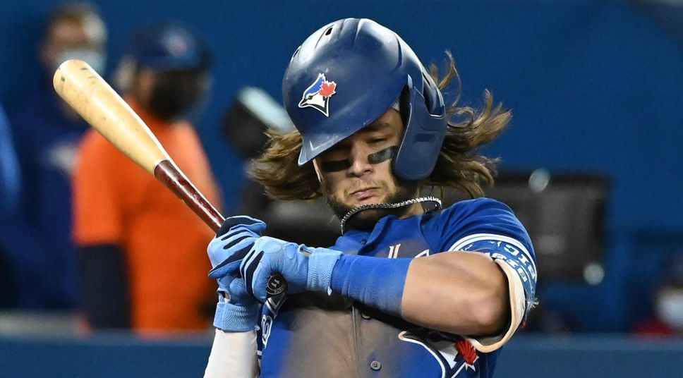 The Blue Jays 'Bo Bichette gets out of the way of an inside pitch by the Yankees' Corey Kluber.