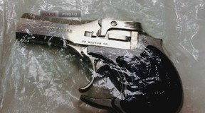 Coffman's pistol.  BROCHURE / CA STATE POLICE