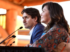 Canadian Prime Minister Justin Trudeau and Kukpi7 Rosanne Casimir speak to the media, members of the Tk'emlups te Secweepemc community and First Nations leaders at the Tk'emlups Pow wow Arbor in British Columbia, Canada, on October 18, 2021. REUTERS / Jennifer Gauthier