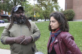 (L) Dreaddz, who was banished from Dufferin Grove Park and issued a notice from the city of Toronto not to appear in the park for a year, and Sima Atri, a social justice attorney and co-director of the Community Justice Collective, are seen here at Dufferin Grove Park on Friday, Oct. 8, 2021.