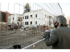 Keith McIntyre discusses the progress demolition crews have made at the El-Mirador Apartments, 10147 108 St., in Edmonton on Wednesday.  October 20, 2021. McIntyre had lived in El-Mirador for 20 years.