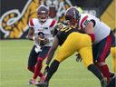 Montreal Alouettes quarterback Vernon Adams Jr. is set to pitch during the first half against the Hamilton Tiger-Cats in Hamilton on October 2, 2021.