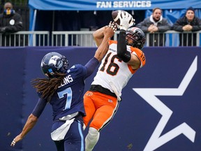 BC Lions wide receiver Bryan Burnham (16) hits a touchdown reception while being defended by Toronto Argonauts defensive back Jalen Collins (7) on Saturday at BMO Field.