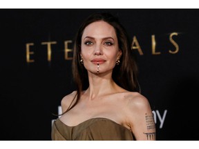 Angelina Jolie poses at the premiere of the film 