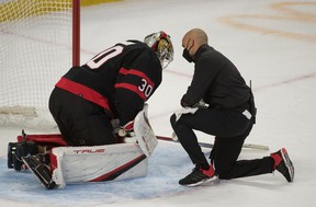 Ottawa Senators goalkeeper Matt Murray (30) is shaken after taking a knee to the head from New York Rangers left wing Chris Kreider (20, not pictured) in the third period at the Canadian Tire Center.