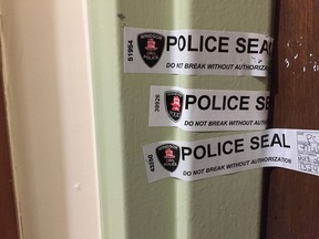 A Windsor Police stamp on the door of Autumn Taggart's apartment at 1382 University Ave. West in Windsor following the discovery of her body on June 10, 2018.