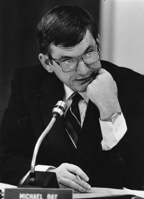 Councilmember Mike Ray appears on the microphone during a council meeting on January 12, 1987.