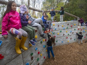 Students from Natural Pathways Forest and Nature School play at the new Enbridge Natural Playground at the Holiday Beach Conservation Area in Amherstburg, Wednesday, Oct. 27, 2021.
