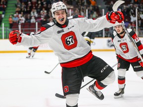 Brenden Sirizzotti celebrates his first goal of the season and the lead goal in Ottawa 67's 3-2 home win over Kingston Frontenac.