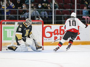 Ottawa's Cameron Tolnai scores his fourth goal of the season on a penalty shot against Kingston goalkeeper Aidan Spooner in the first period of Saturday's game.