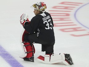 Mads Sogaard takes a break during Senators development practice at the Canadian Tire Center in September 2021.