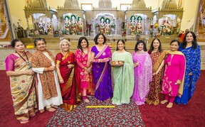 Members of the Burnaby Hindu Temple as they prepare for Diwali on Thursday.