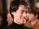 Montreal-trained Bruce (Xiaoyu) Liu reacts after being announced as the winner of the 18th Fryderyk Chopin International Piano Competition in Warsaw, Poland on October 21, 2021.
